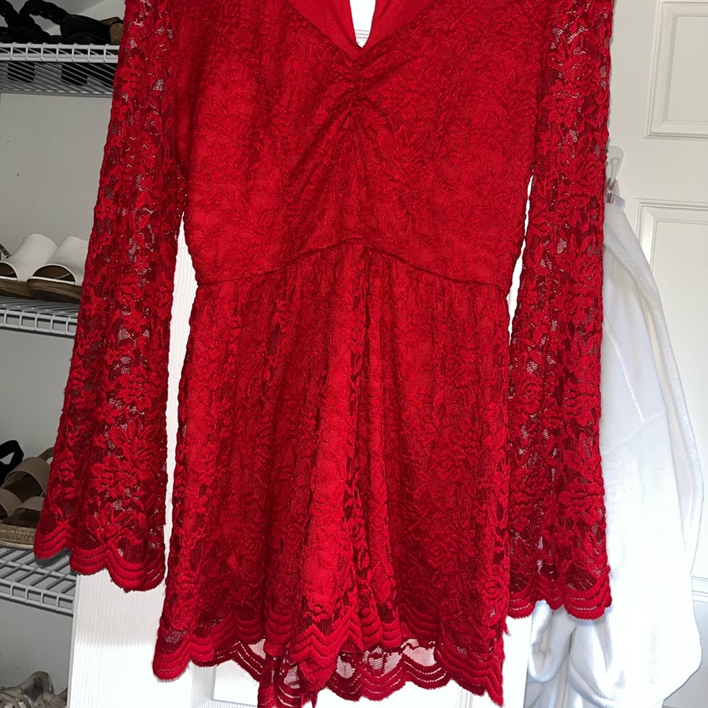 Red jumpsuit. Size S. Good condition. Bought at boutique.